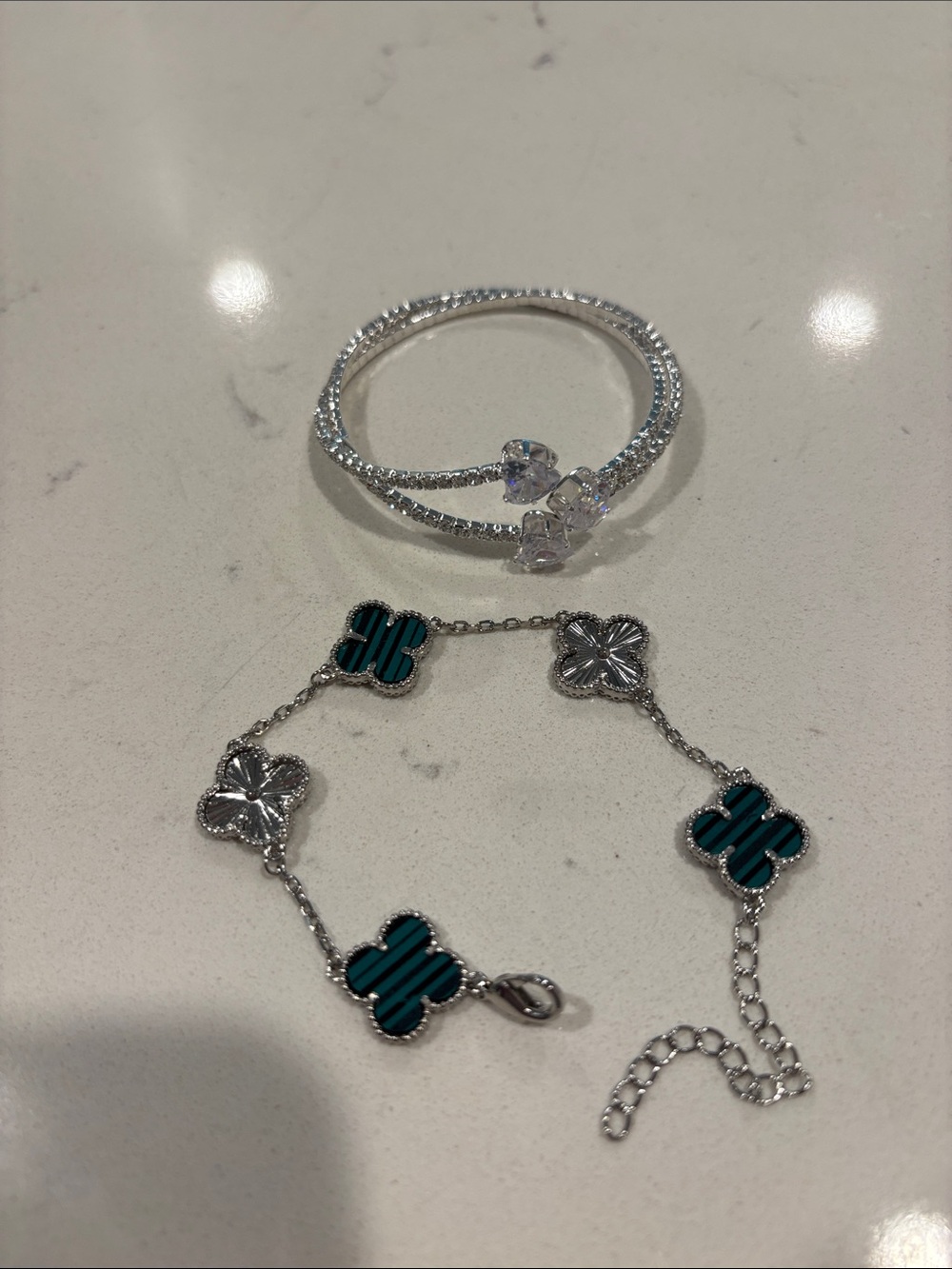 Two bracelet bundle: Silver Four-Leaf Clover Bracelet and diamond heart bangle